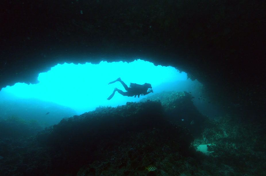 scuba diver-exploring- cave - cave diving - scuba diving - scubly
