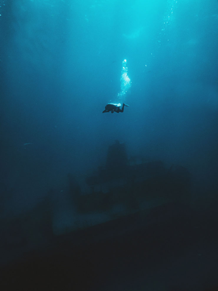 scuba-diving over wreck - decompression sickness - scuba diving - scubly