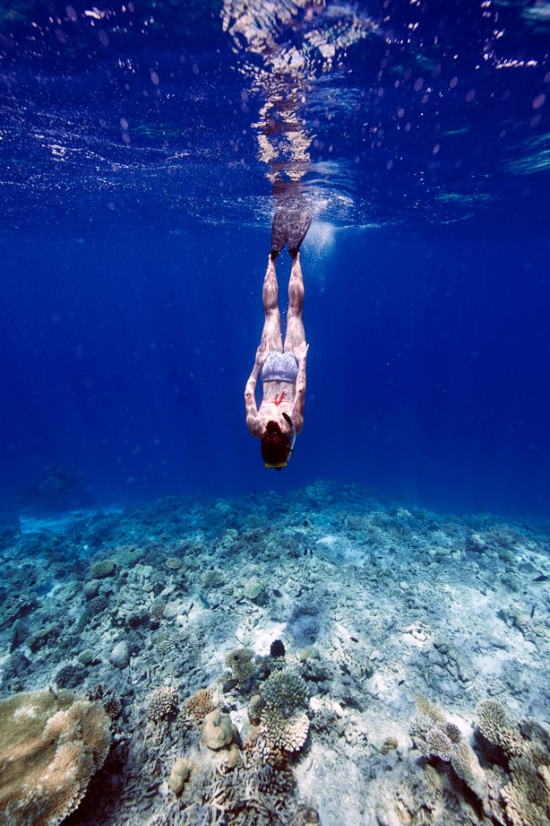 woman-snorkeling- bikini atoll - scuba diving - scubly