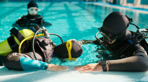 scuba diving certification courses for professionals - divers are training - scubly